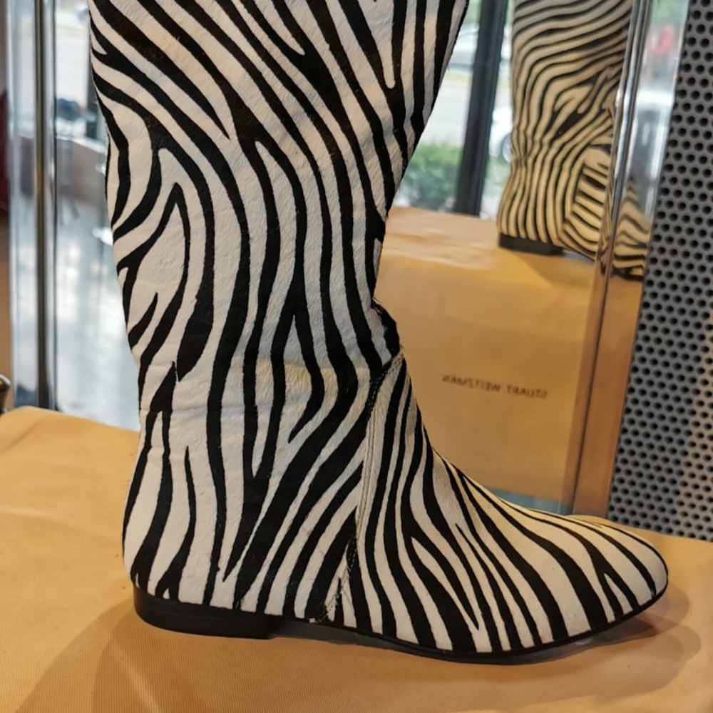 Zebra print knee high boots